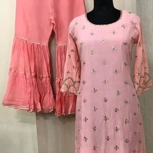 Muslin designer plazo suit available in M and large size with hand work